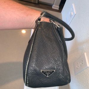prada dinosaur bag